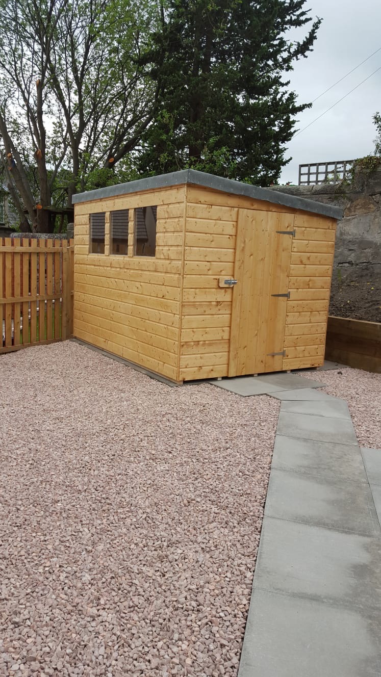 Pressure-treated tongue-and-groove garden shed with apex roof installed in Livingston West Lothian